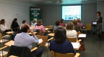 Los asistentes a la jornada, durante la exposición de Eva Guardo 