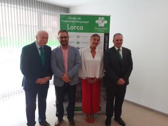 Foto de familia de los directivos de la mutua y las autoridades presentes