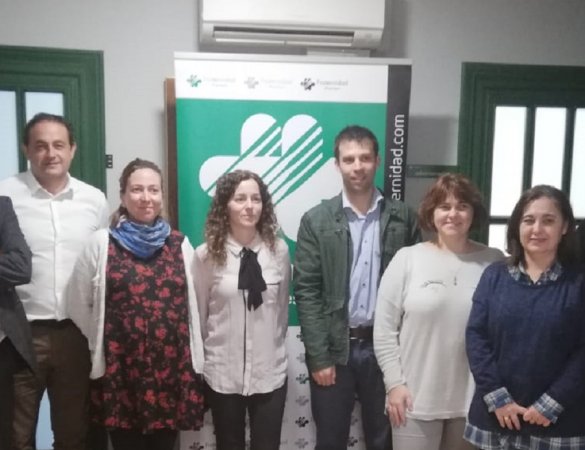 Banner Foto de familia de los organizadores de la jornada y los asistentes a la misma
