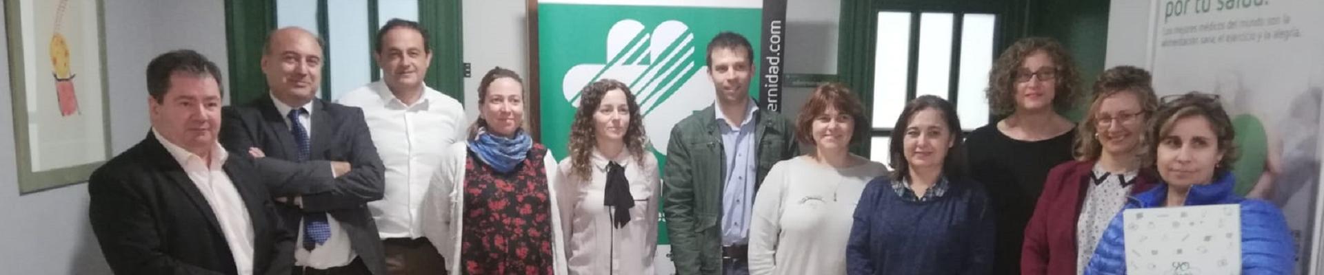 Banner Foto de familia de los organizadores de la jornada y los asistentes a la misma