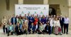 Foto de familia tras la clausura de la jornada