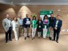 Foto de grupo correspondiente a la entrega de una placa conmemorativa de la jornada